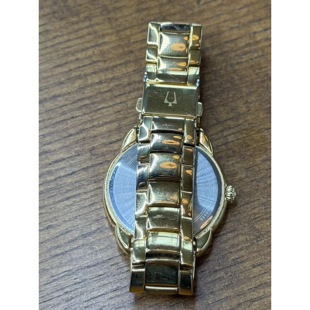 Bulova Maribor 98R171 Gold Tone Watch Diamond Bezel Day Date Women 36mm